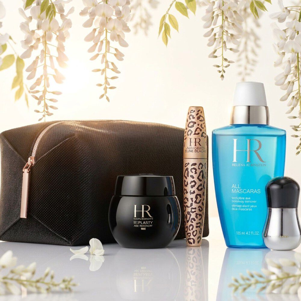 Helena Rubinstein products under white wisteria.​