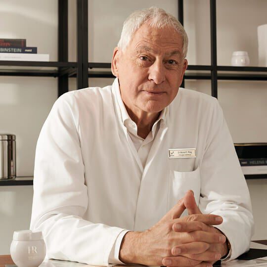 Dr. Michel E. Pfulg, associated with Helena Rubinstein REPLASTY, in a professional setting.