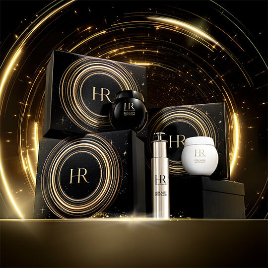 A luxurious presentation of Helena Rubinstein products, featuring two black gift boxes adorned with golden patterns, a Re-Plasty Age Recovery cream in a black jar, a Re-Plasty Pro-Filler serum in a silver bottle, and a Re-Plasty Age Recovery cream in a white jar. The collection is showcased on a golden surface against a black background with luminous golden spirals, evoking elegance and refinement.