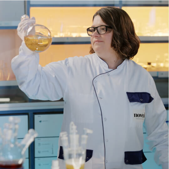 Scientist formulating Pro-Xylane™ in lab for Helena Rubinstein Replasty innovation. 