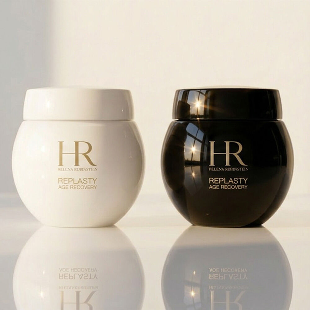 Replasty Age Recovery Day jars in a creamy white texture swirl.​