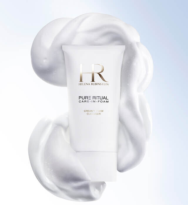 Helena Rubinstein Pure Ritual Care-in-Foam tube surrounded by its dense, silky cream-to-foam texture.