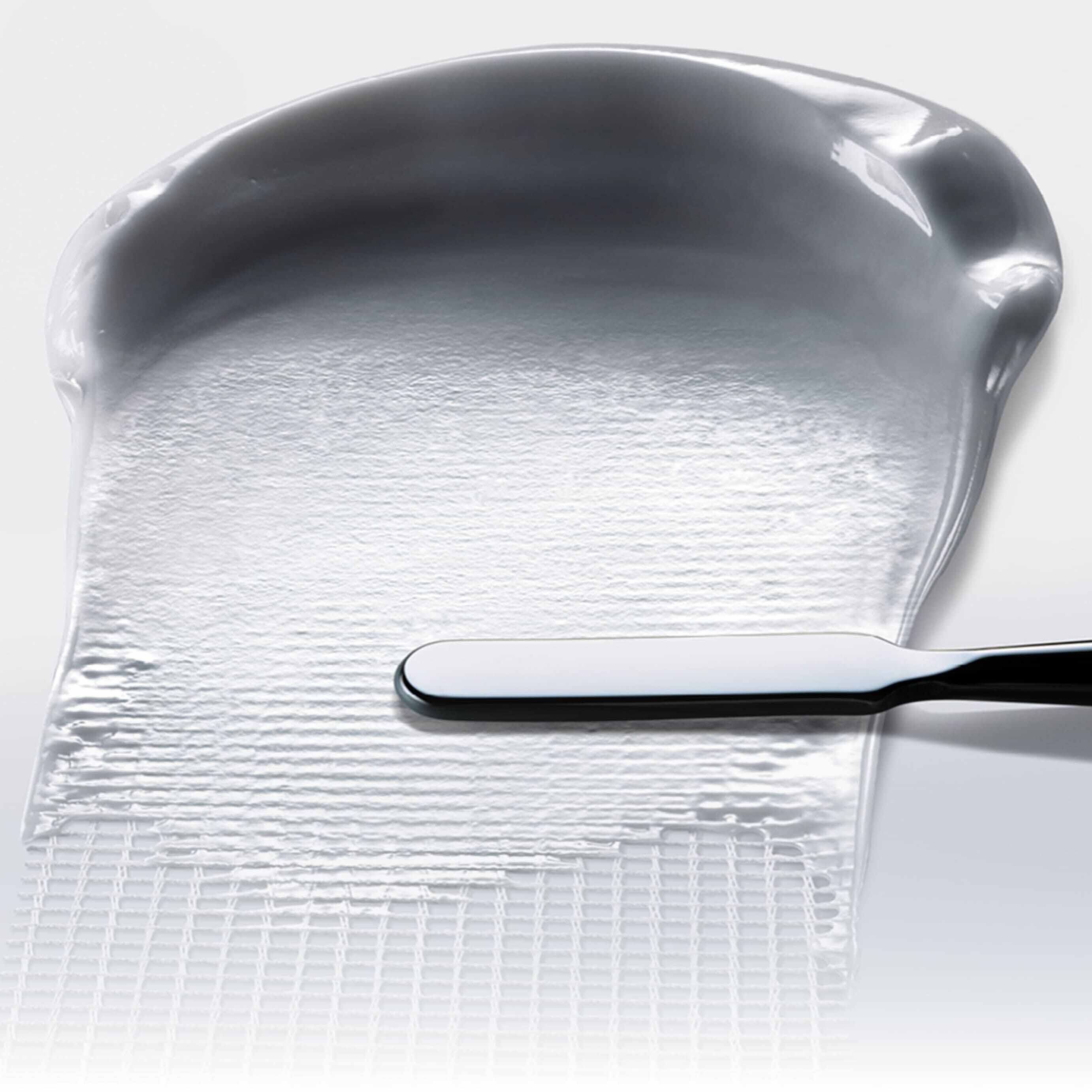 Helena Rubinstein REPLASTYs breathable bandage texture, spread with a spatula for skin repair.