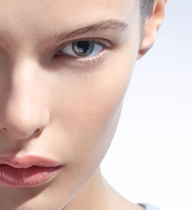 Model with clear skin illustrating Pure Ritual benefits: removes pollution, maintains barrier, and rebalances.