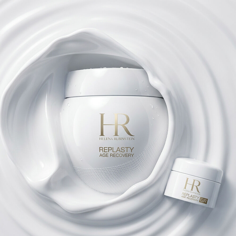 Replasty Age Recovery Day jars in a creamy white texture swirl.​
