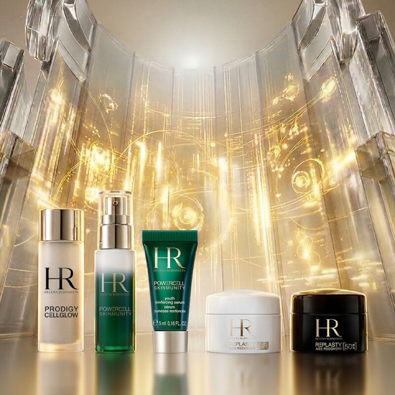 Helena Rubinstein skincare set with white pouch under wisteria.​
