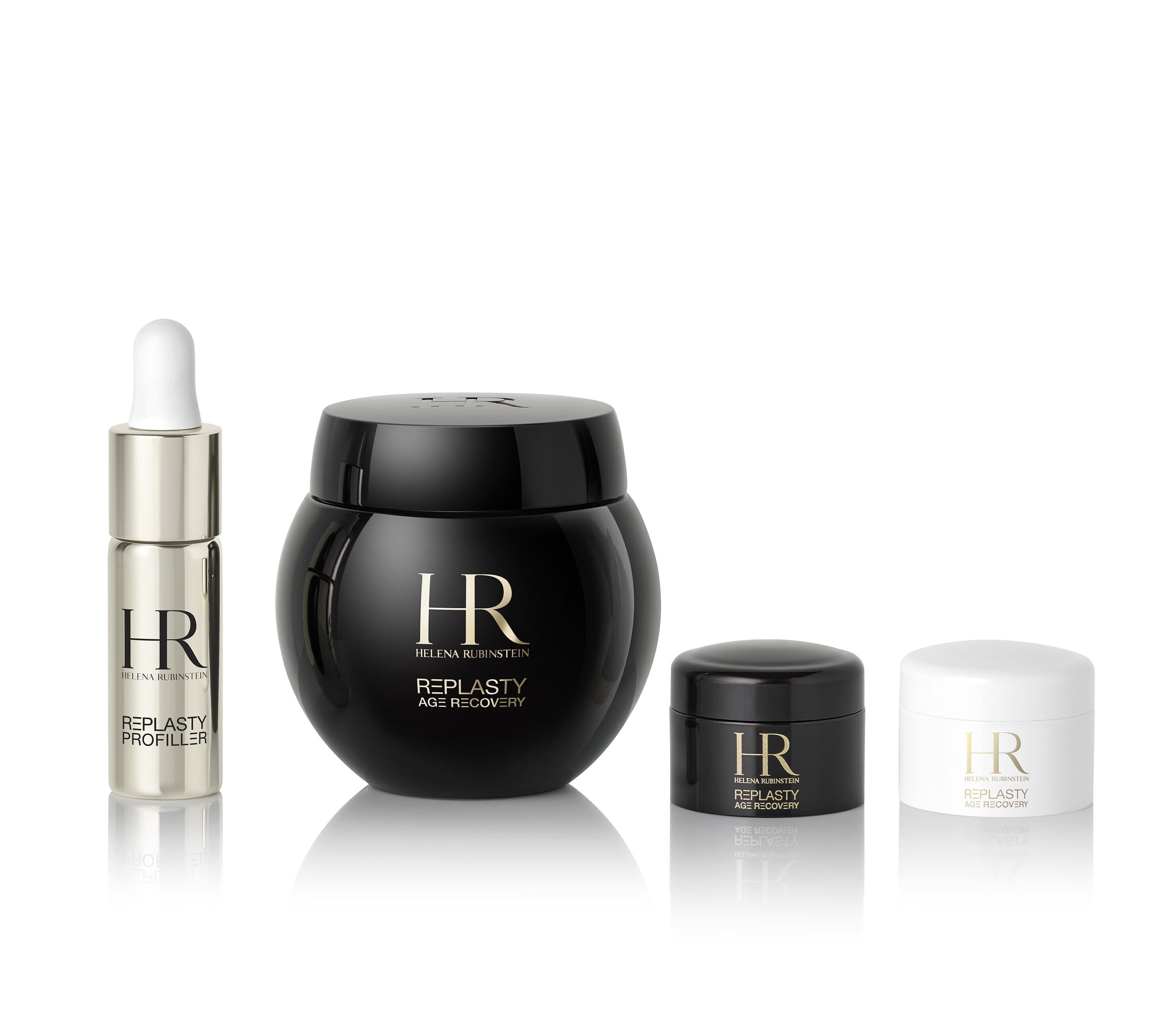 Four Helena Rubinstein "Re-Plasty Age Recovery" products: a dropper bottle, a large black jar, a small black jar, and a small white jar. Elegant presentation on a reflective white background.