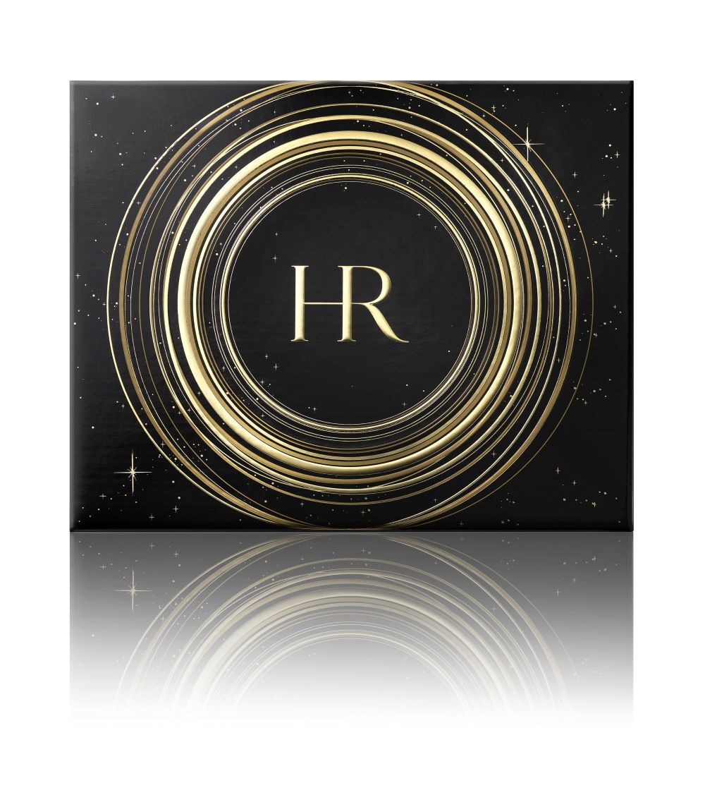 Opened black and gold gift box, showcasing four labeled Helena Rubinstein "Re-Plasty" products (serum, night cream, day cream) and the "HR" logo, on a white background.