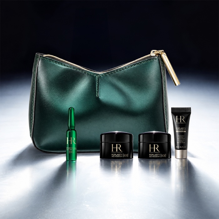 A green Helena Rubinstein cosmetic pouch displayed in front of a bright landscape, surrounded by four miniature skincare products.
